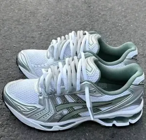 ASICS GEL-Kayano 14 in White/Slate Grey Sneakers