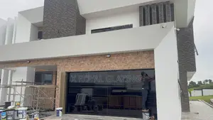 Modern Remote Control Frameless Glass Garage Door Well Installed