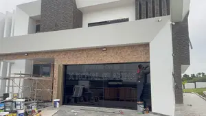 Modern Remote Control Frameless Glass Garage Door Well Installed