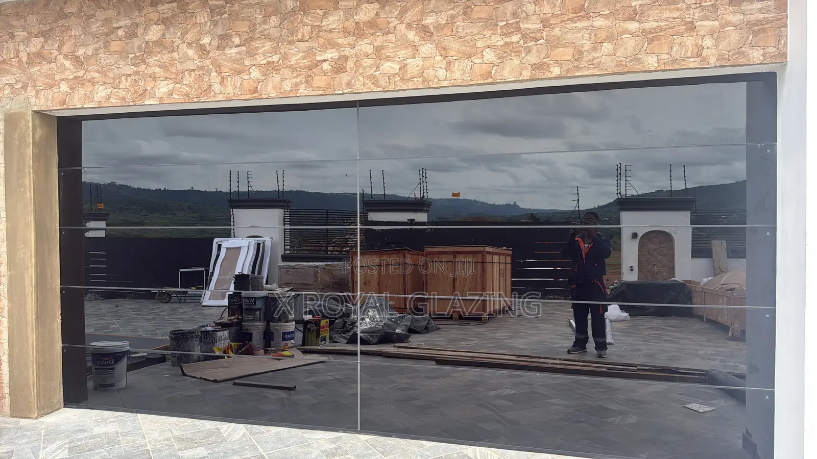 Modern Remote Control Frameless Glass Garage Door Well Installed