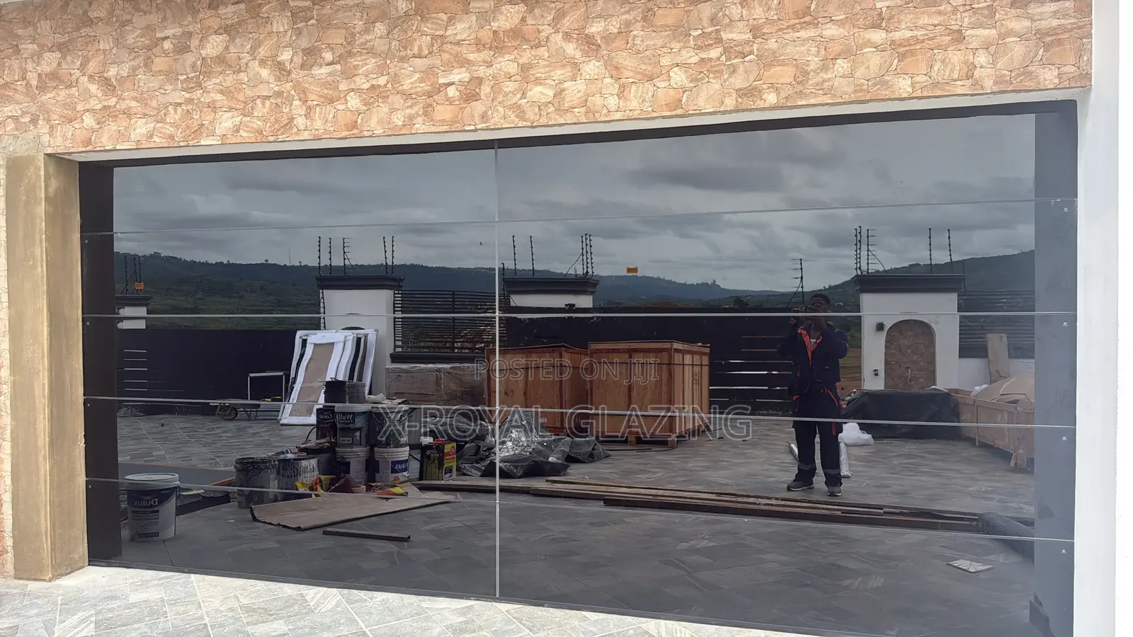 Modern Remote Control Frameless Glass Garage Door Well Installed