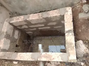 Bathroom Facility With Biodigester and Plumbing