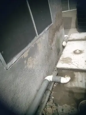 Bathroom Facility With Biodigester and Plumbing