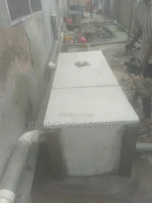 Bathroom Facility With Biodigester and Plumbing