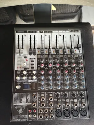 Behringer Xenyx 1204FX Audio Mixing Console.