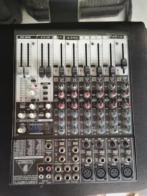 Behringer Xenyx 1204FX Audio Mixing Console.
