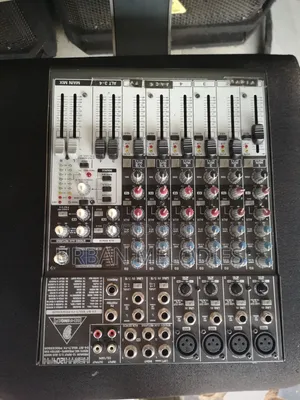 Behringer Xenyx 1204FX Audio Mixing Console.