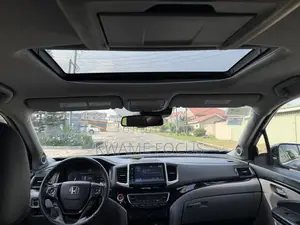 Honda Pilot Touring 4dr SUV 4WD (3.5L 6cyl 9A) 2017