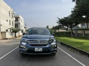 Honda Pilot Touring 4dr SUV 4WD (3.5L 6cyl 9A) 2017
