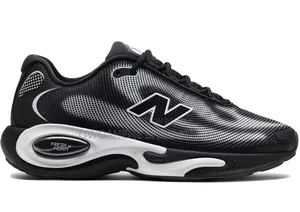 Shoes in the Image Are the Ke Runner in the Black and White Colorway.