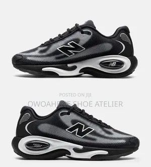 Shoes in the Image Are the Ke Runner in the Black and White Colorway.