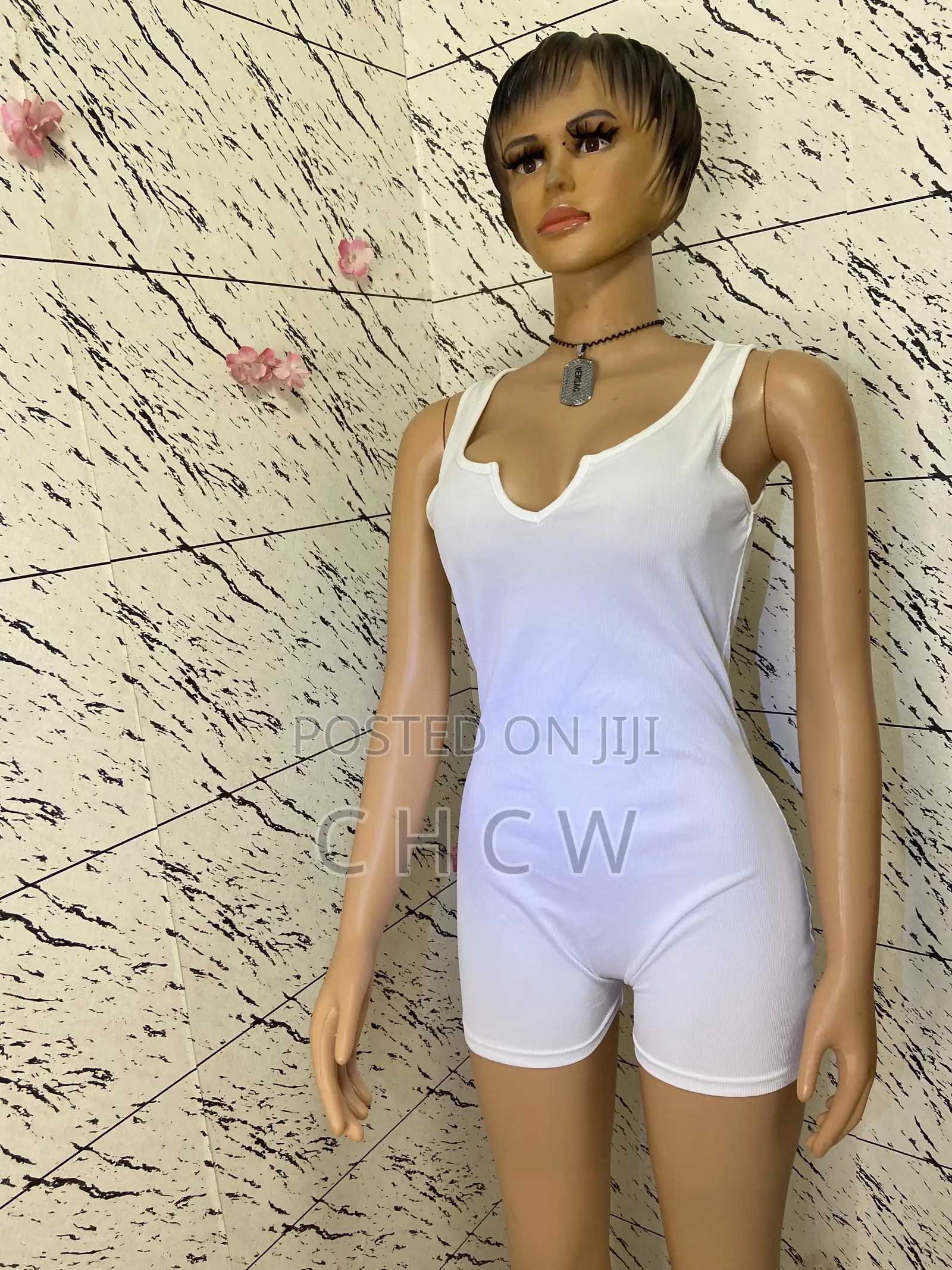 A White Jumpsuit Roper and a Colorful Beach Bikini Wear
