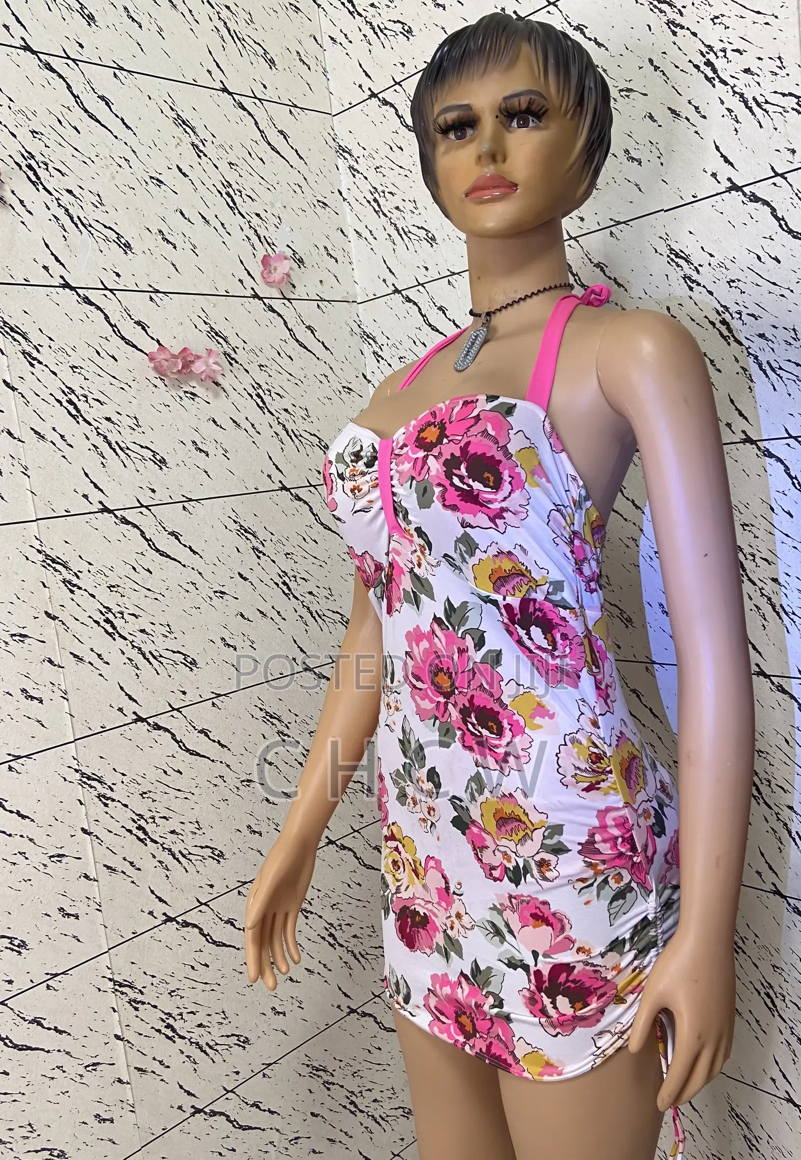 A White Jumpsuit Roper and a Colorful Beach Bikini Wear