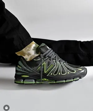 New Balance 1890 in the "Faded Black / Utility Green"