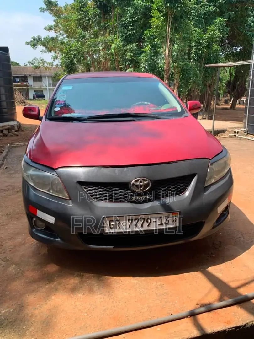 Toyota Corolla Base 4dr Sedan (1.8L 4cyl 5M) 2010 Red