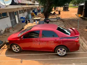 Toyota Corolla Base 4dr Sedan (1.8L 4cyl 5M) 2010 Red