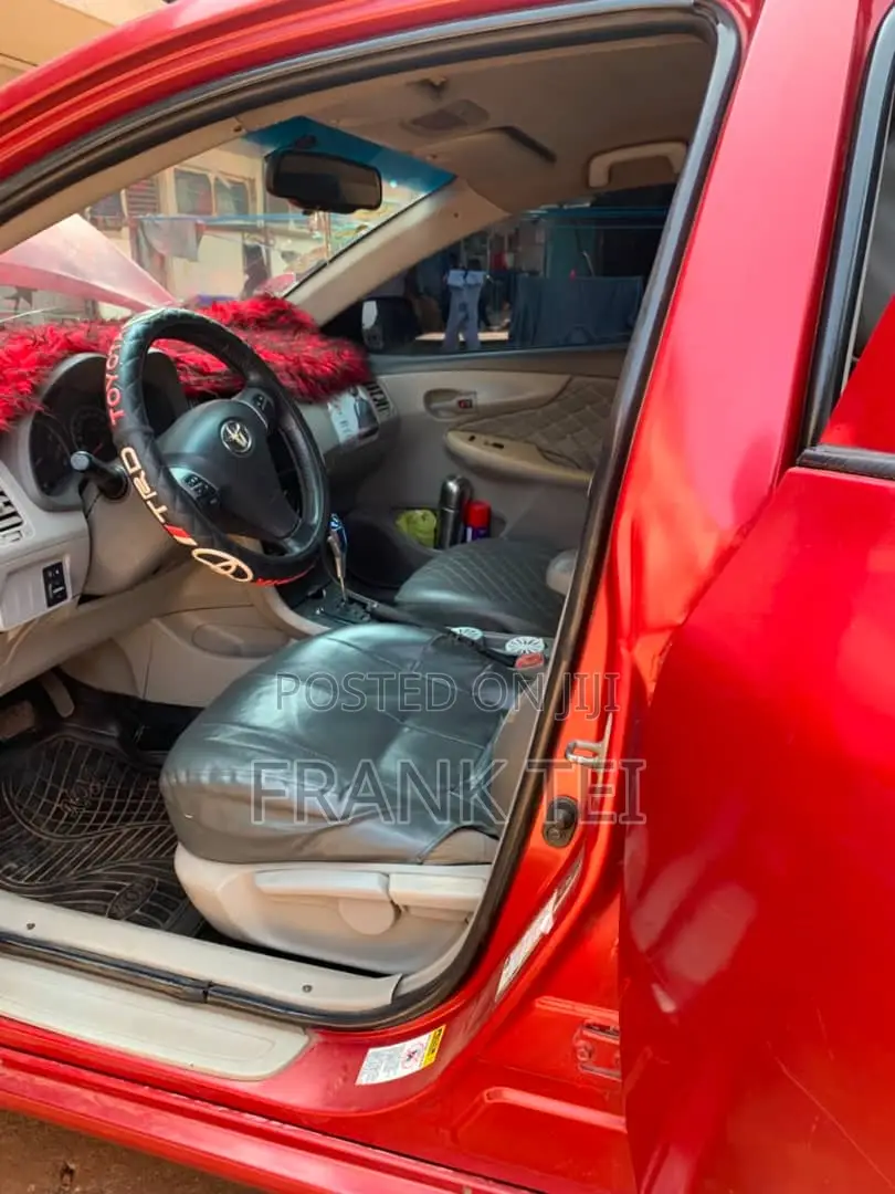 Toyota Corolla Base 4dr Sedan (1.8L 4cyl 5M) 2010 Red