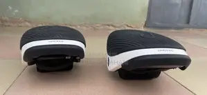 The Image Shows a Pair of Segway Ninebot Drift W1 Electric Skates, Bal