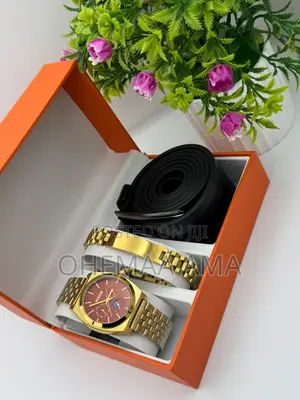 Gold Nixon Watch and Accessories