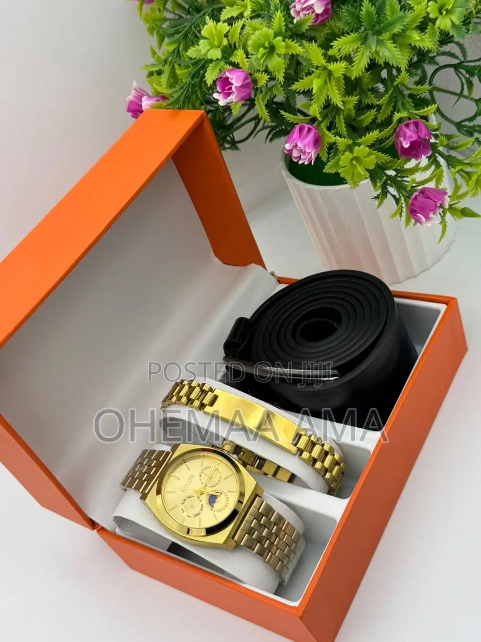 Gold Nixon Watch and Accessories