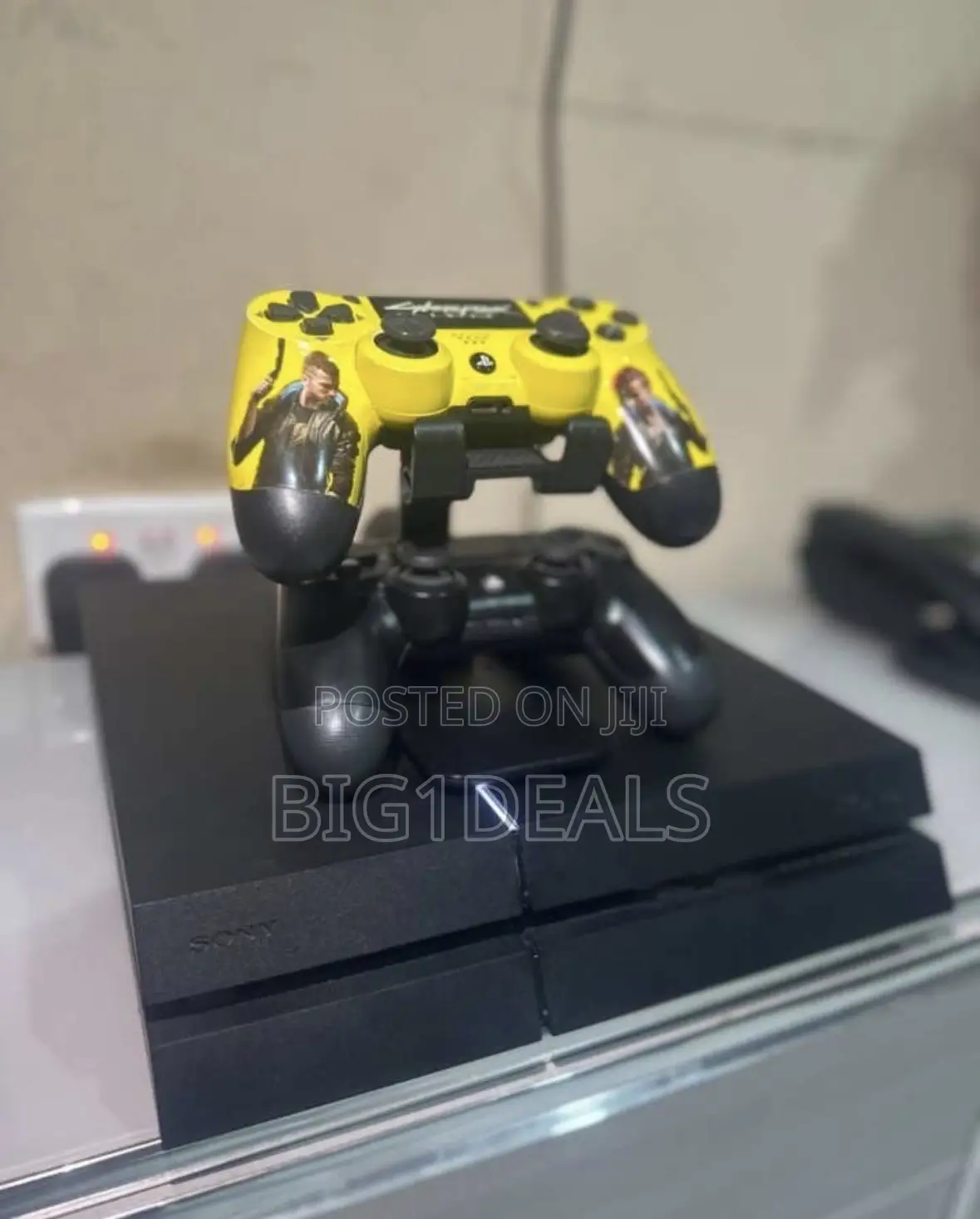 PS4 Standard With 2 Controllers and 5solid Games.
