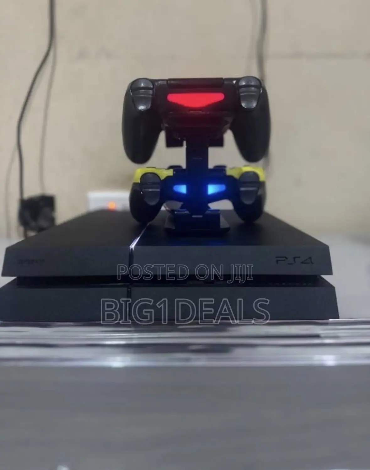 PS4 Standard With 2 Controllers and 5solid Games.