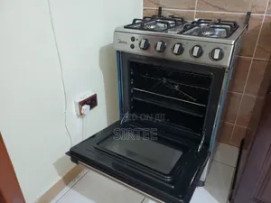 Midea Gas/Oven Cookers -Relocation Sale.