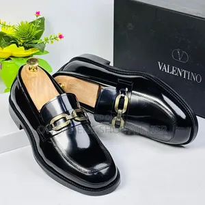 Men's Black Horsebit Patent Loafers.