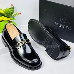 Men's Black Horsebit Patent Loafers.