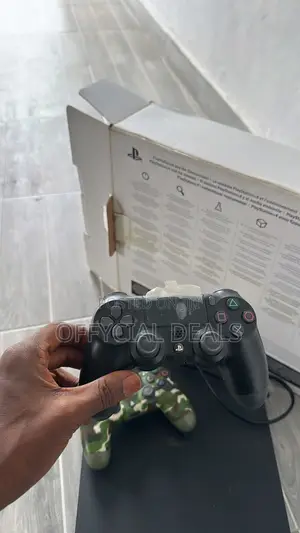 PS4 Slim With Two Controllers
