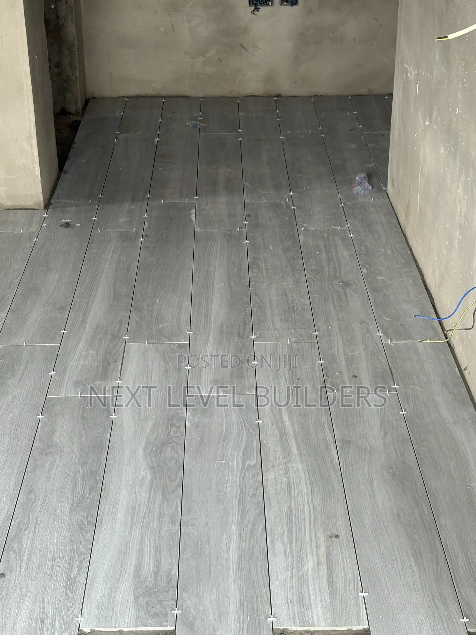 “Professional Floor & Wall Tiling Services by Next Level Builders.”