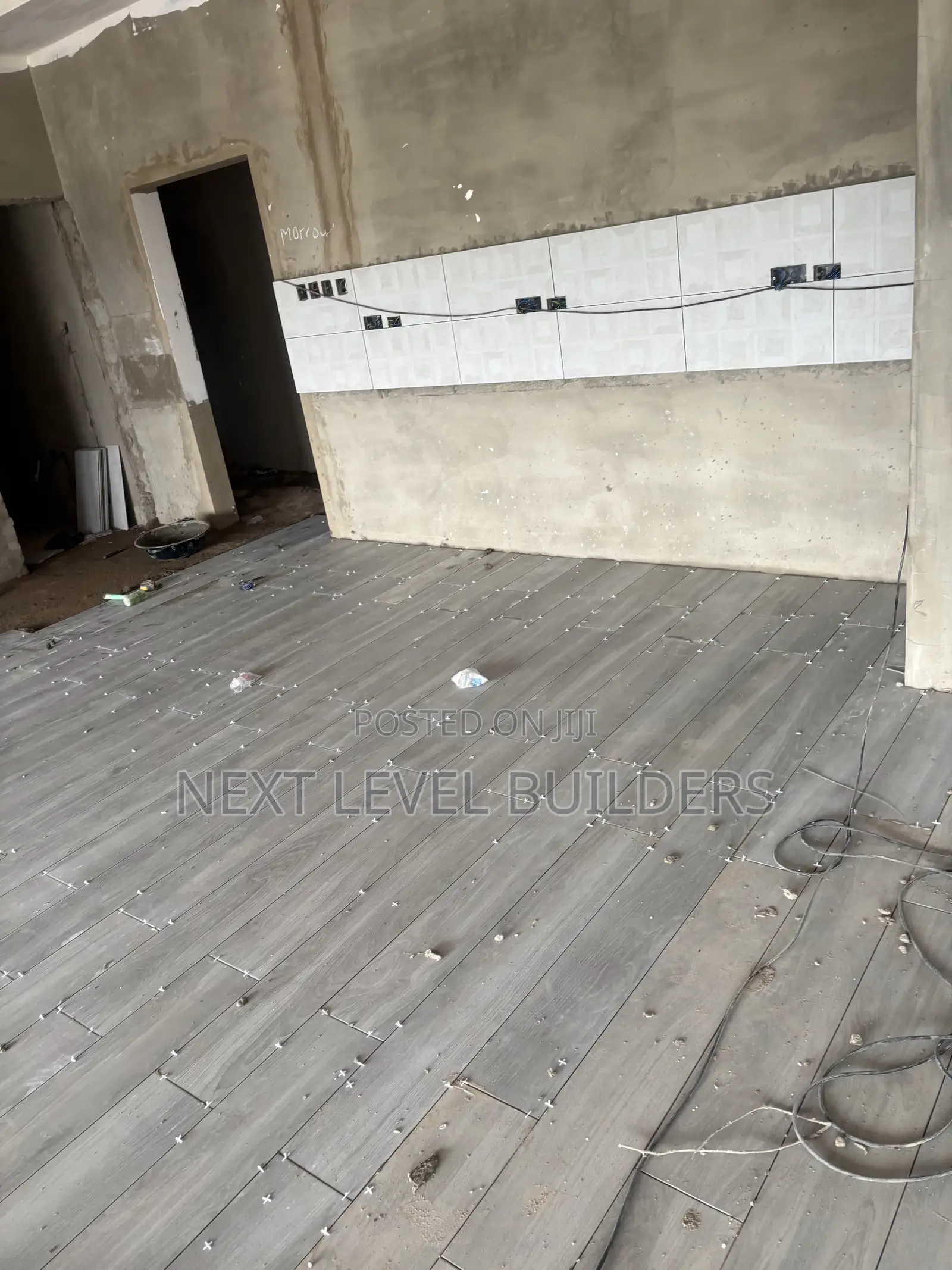 “Professional Floor & Wall Tiling Services by Next Level Builders.”