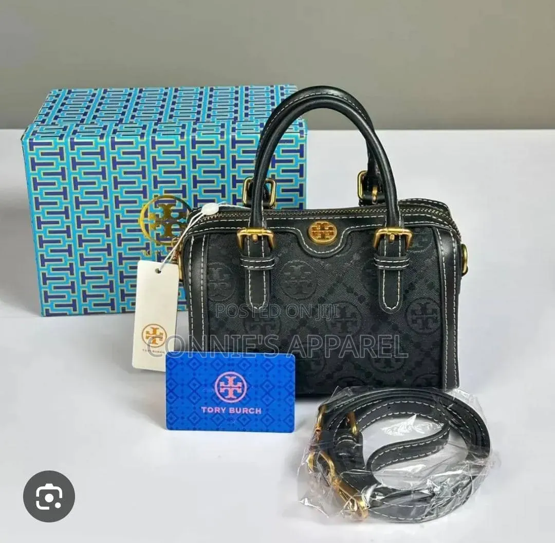 Embossed Monogram Pattern and Buckled Top Handle