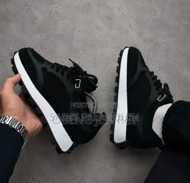 These Are Bruno Renzoni Mesh and Leather Sneakers Black and White