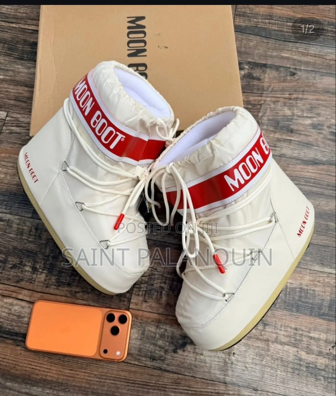 White Moon Boot Snow Boots a Bold Red Logo Strap Acros