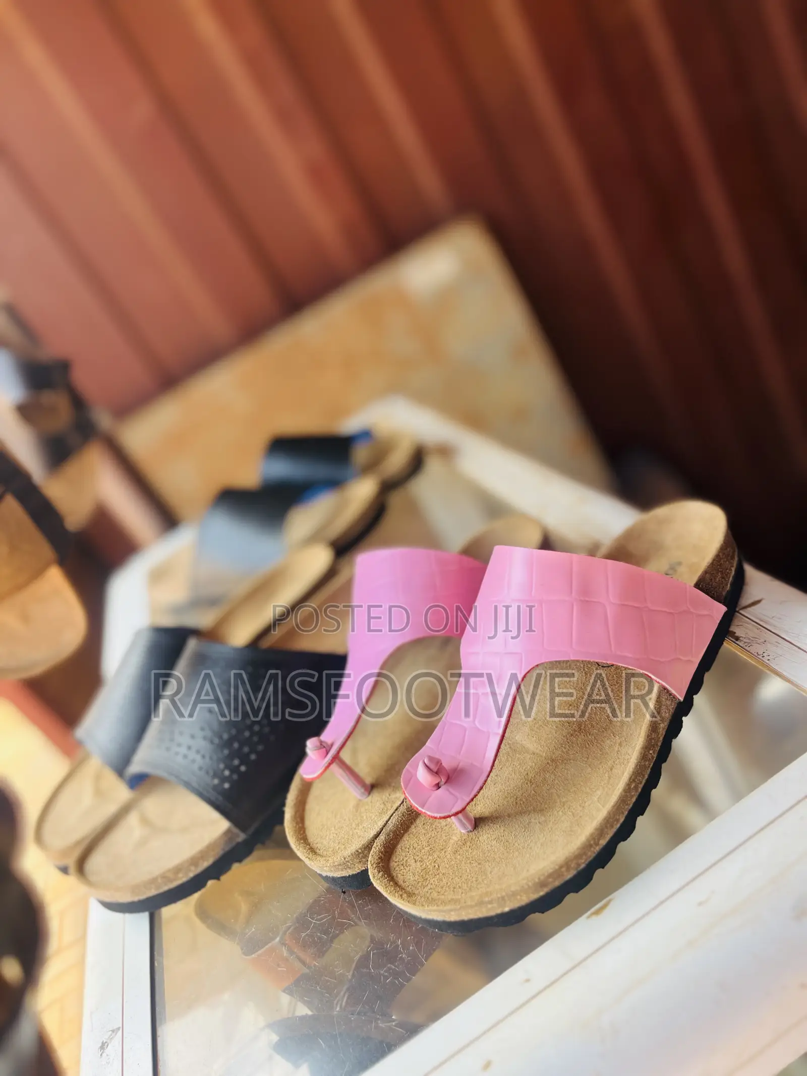 Pink Croc-Embossed Thong Sandal Featuring a Classic Cork Footbed.