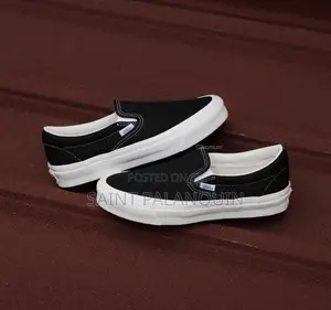 A Classic Black Canvas Vans Slip-on Sneakers