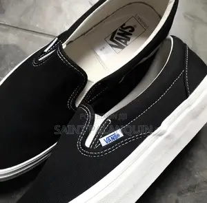 A Classic Black Canvas Vans Slip-on Sneakers
