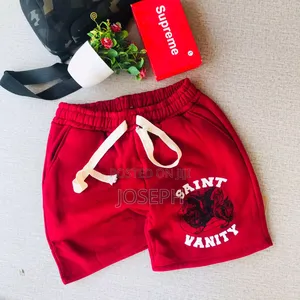 Red Graphic Drawstring Shorts With a Bold Dripping-Style Design