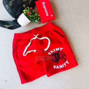 Red Graphic Drawstring Shorts With a Bold Dripping-Style Design