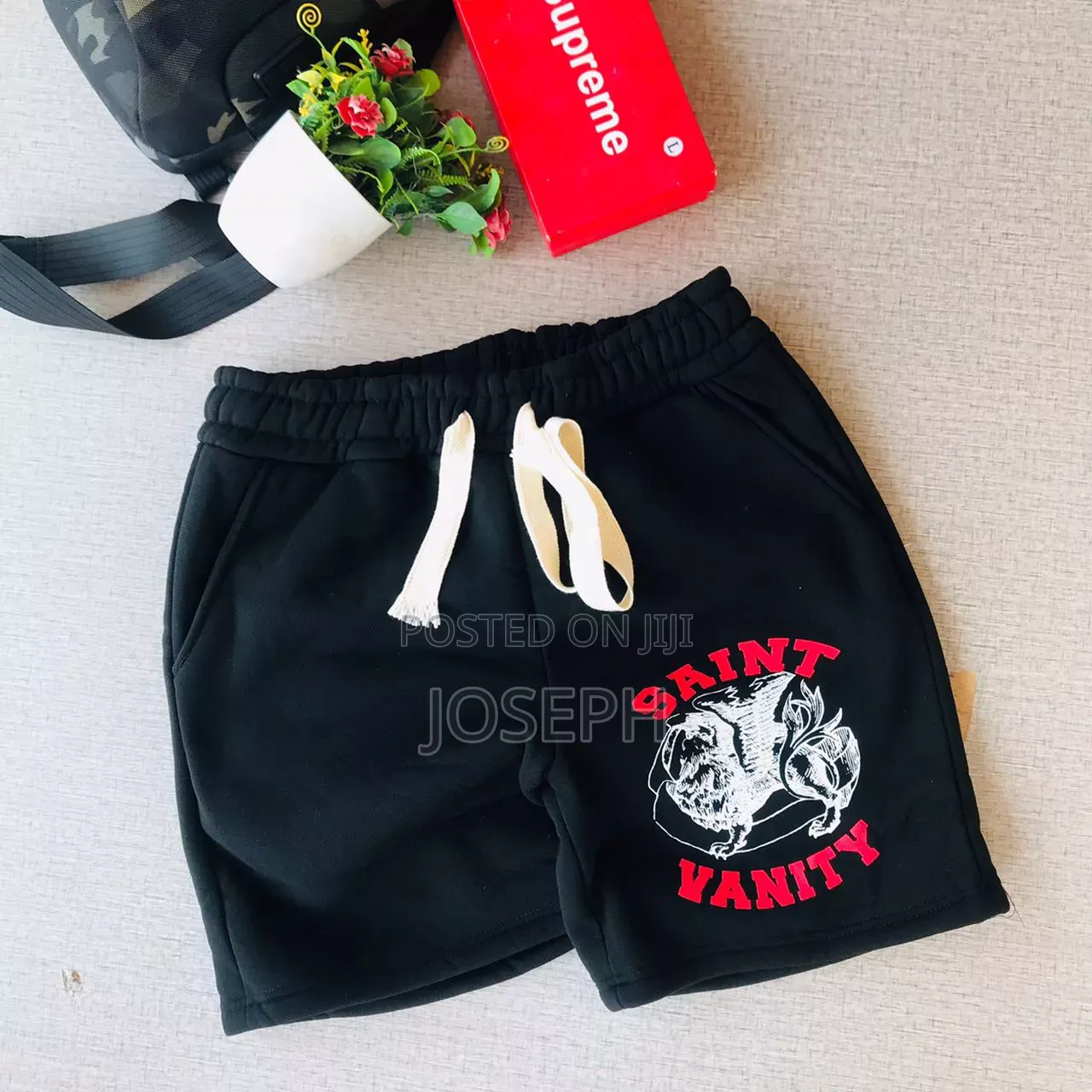 Red Graphic Drawstring Shorts With a Bold Dripping-Style Design