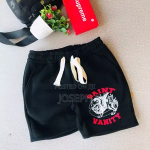 Red Graphic Drawstring Shorts With a Bold Dripping-Style Design
