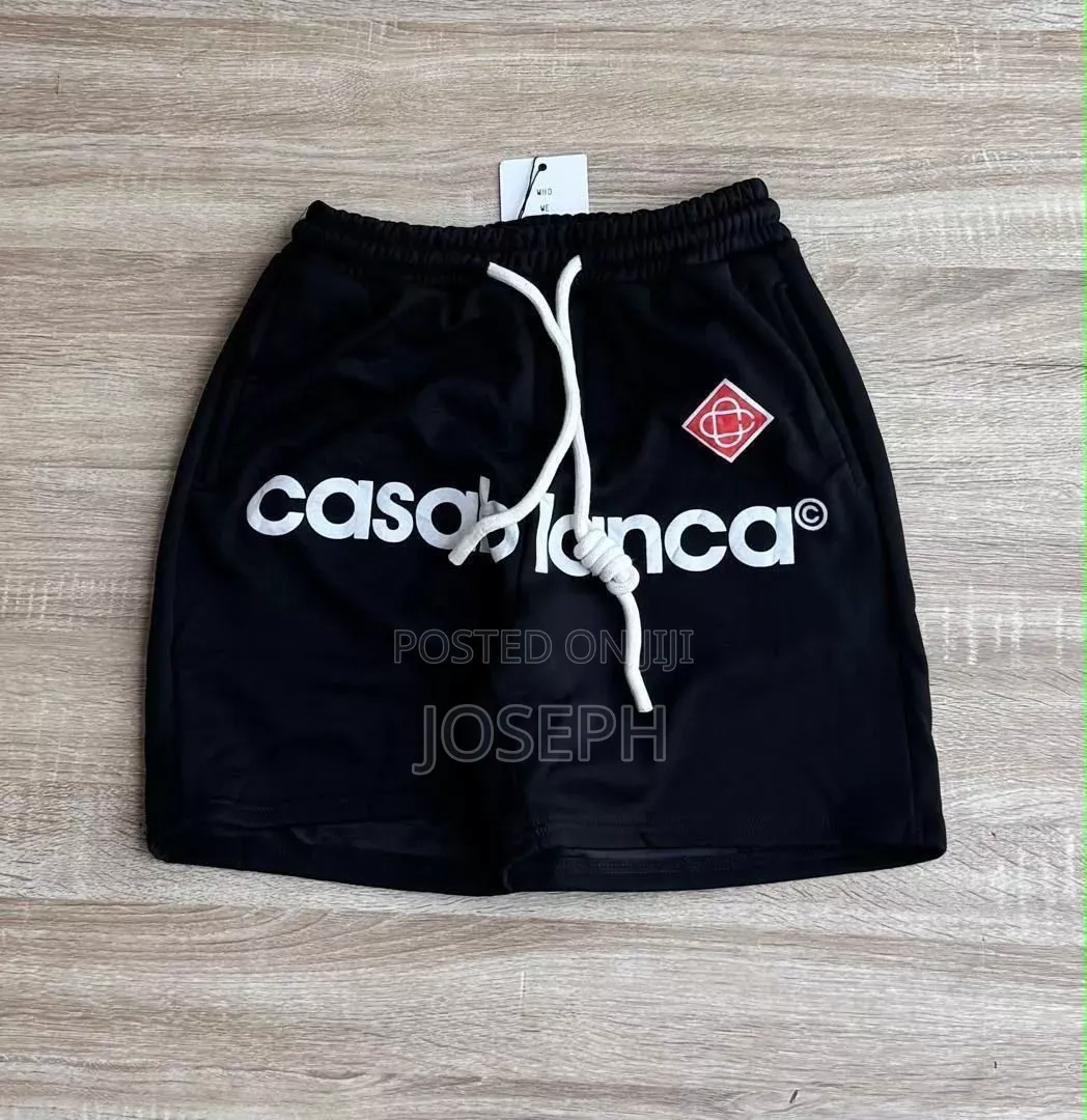 Red Graphic Drawstring Shorts With a Bold Dripping-Style Design