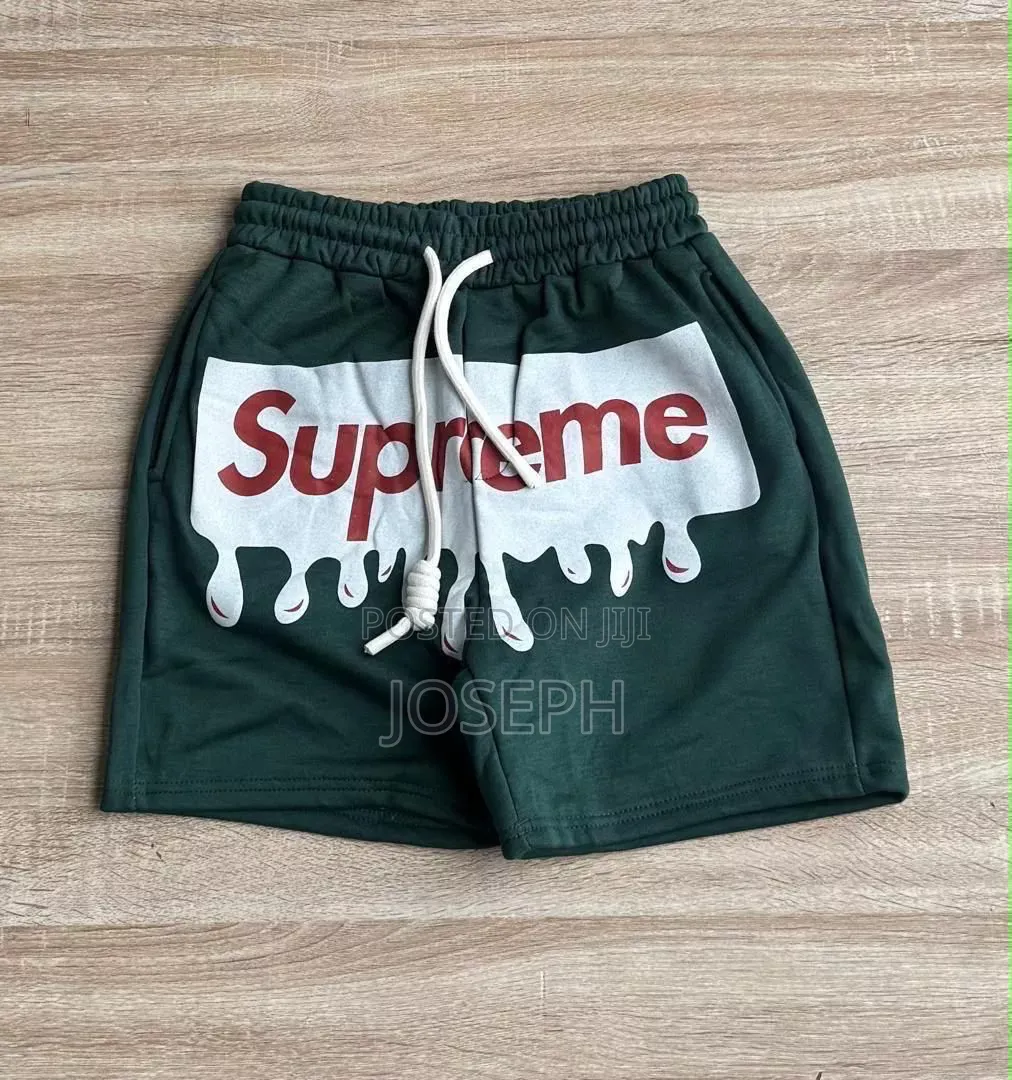 Red Graphic Drawstring Shorts With a Bold Dripping-Style Design