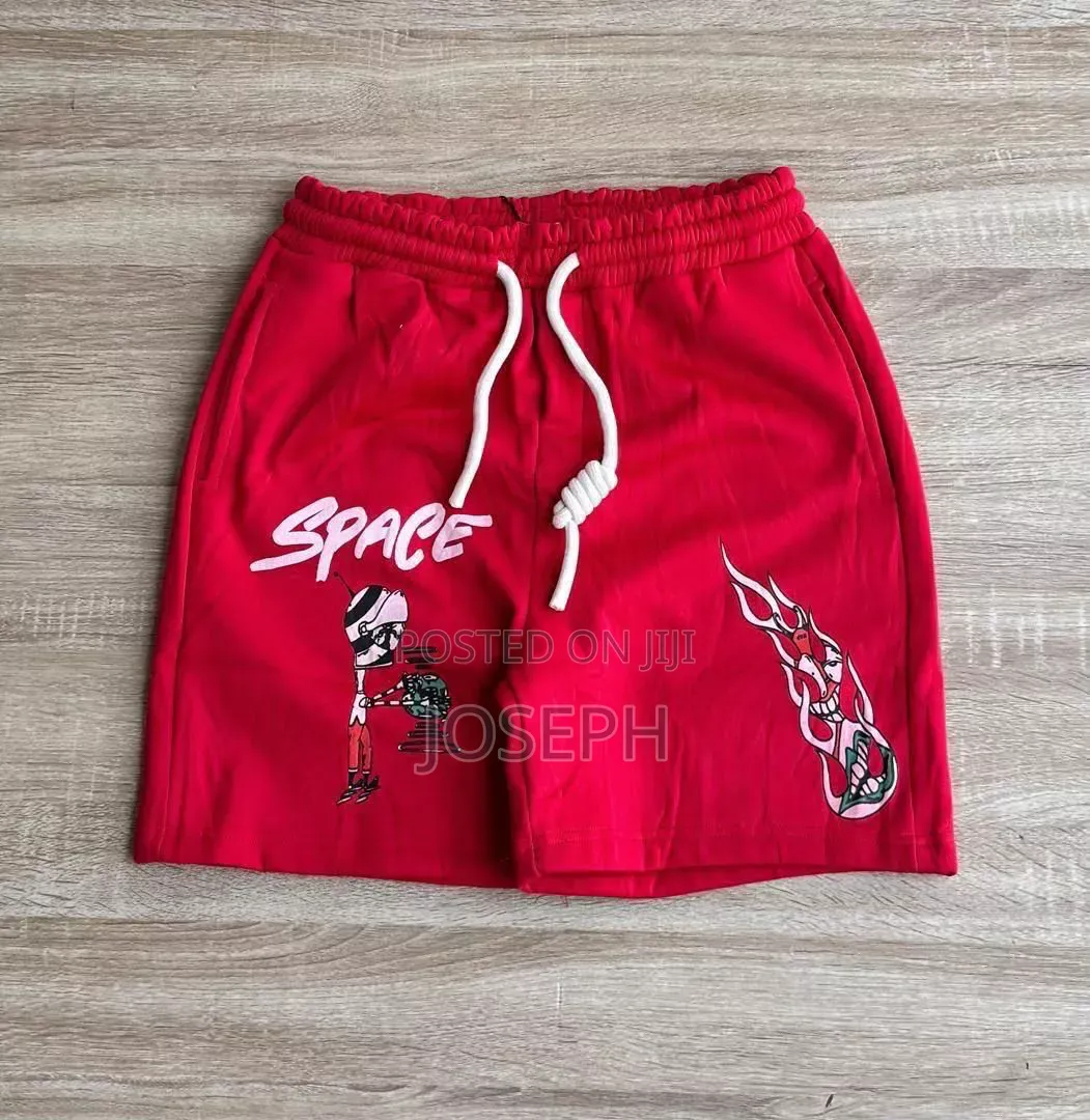Red Graphic Drawstring Shorts With a Bold Dripping-Style Design