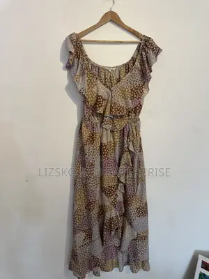 Flowy Midi Dress Featuring a Multi-Pattern Floral Print