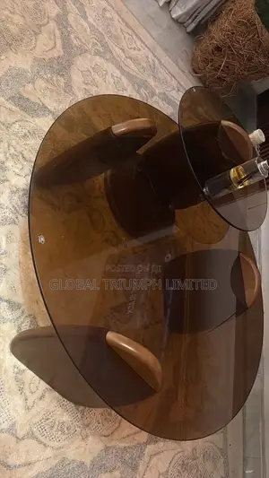 Round Multi-Tiered Coffee Table Featuring  Wood Finish Wooden Base
