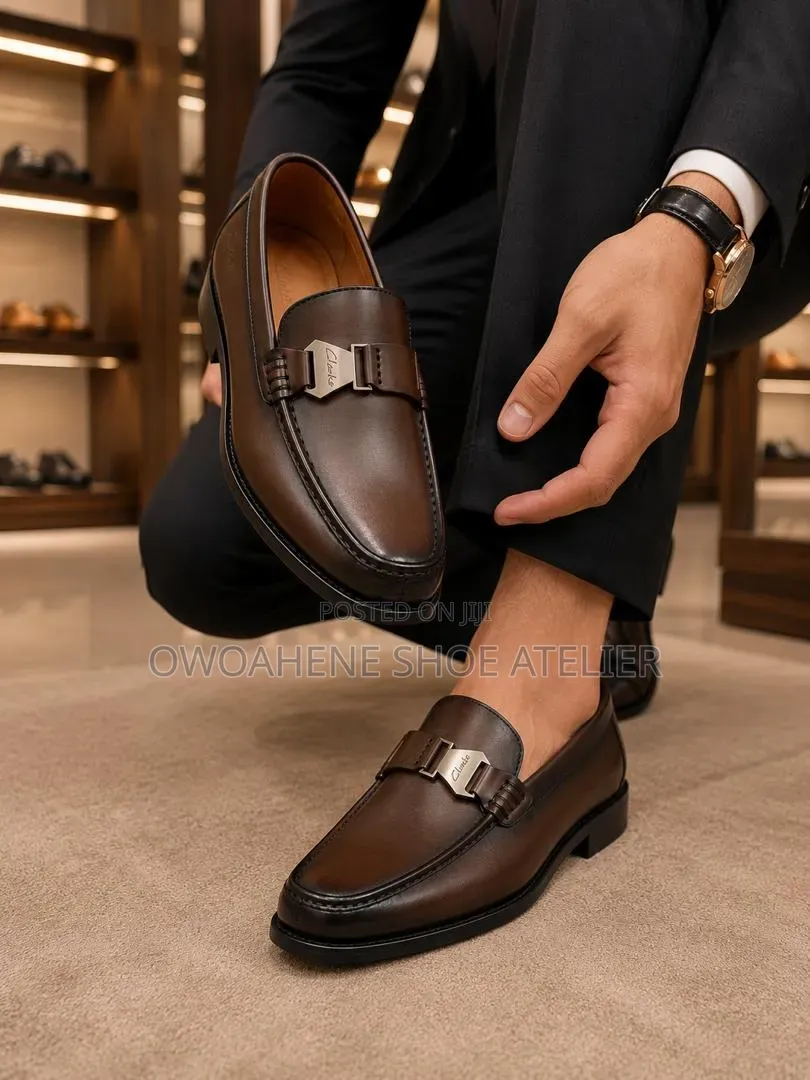 Clarks Brown Leather Strap Loafers.