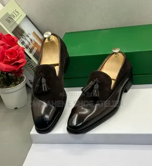 Robby Rosata Suede and Leather Patchwork Tassel Loafer.