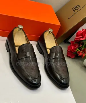 Roberto Guerrero Embossed Leather Penny Loafers